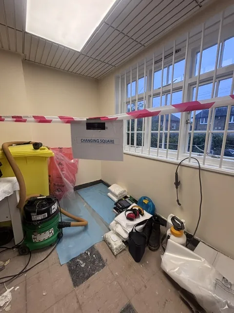 Asbestos floor tile and bitumen removal in Chiswick